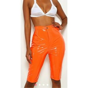 Ami Clubwear orange vinyl shorts NWOT